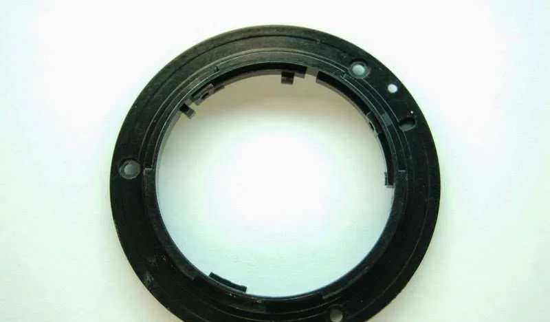 reparación cámaras digitales anilla óptica nikon