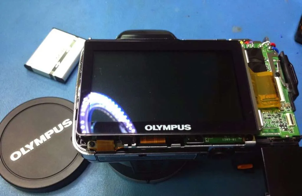 Servicio-tecnico-reparacion-camaras-de-fotos-olympus-IMG_0692-Juan-Luis-Martel-Tecnico-electronica-Las-Palmas-1024x768.jpg
